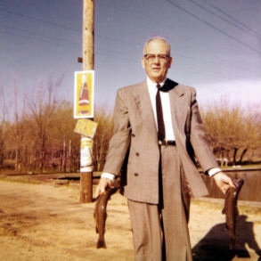 George 1958 68th Birthday.jpg - 1958. Henry George "Hank" Kaiser on his birthday. Looks like he just went fishing - with his suit on!